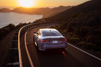 M4 on a beach road at sunset